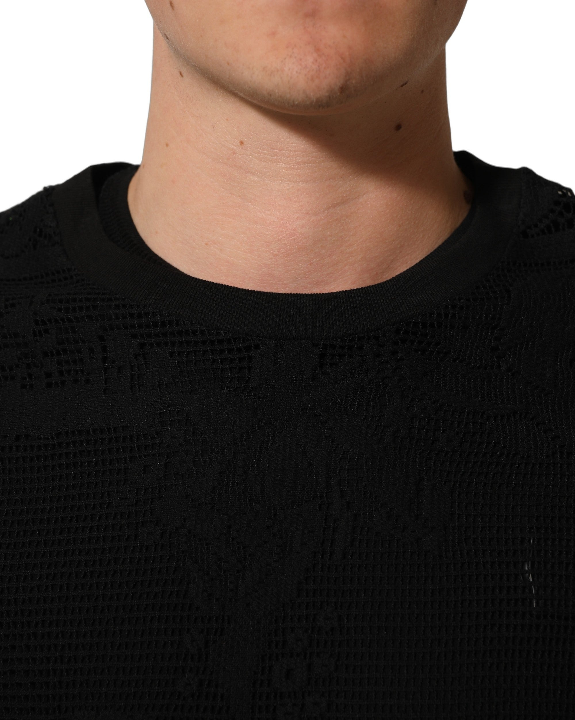 T-shirt noir en coton avec dentelle florale et col rond de Dolce & Gabbana, vue de face.