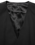 Gilet formel en laine noire Dolce & Gabbana avec taille extensible, porté de manière élégante sur un mannequin.