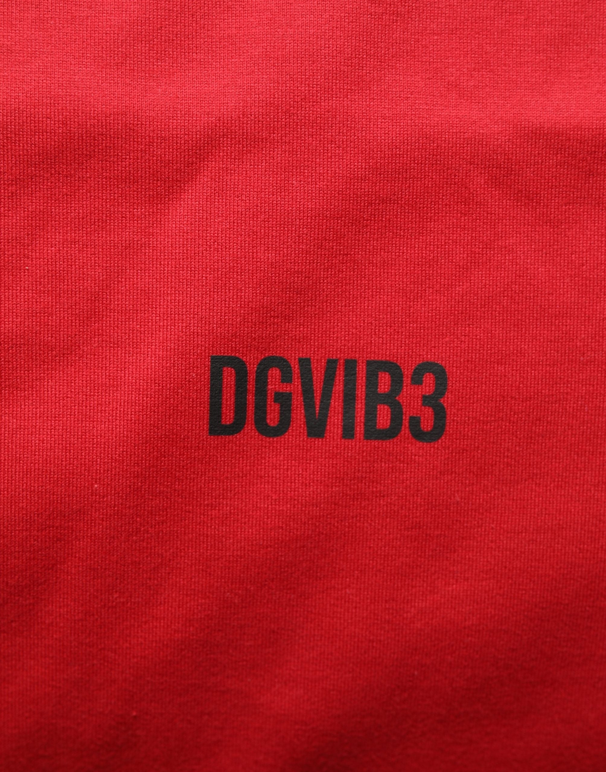 T-shirt rouge en coton Dolce & Gabbana avec motif graphique à col rond, vue de face.