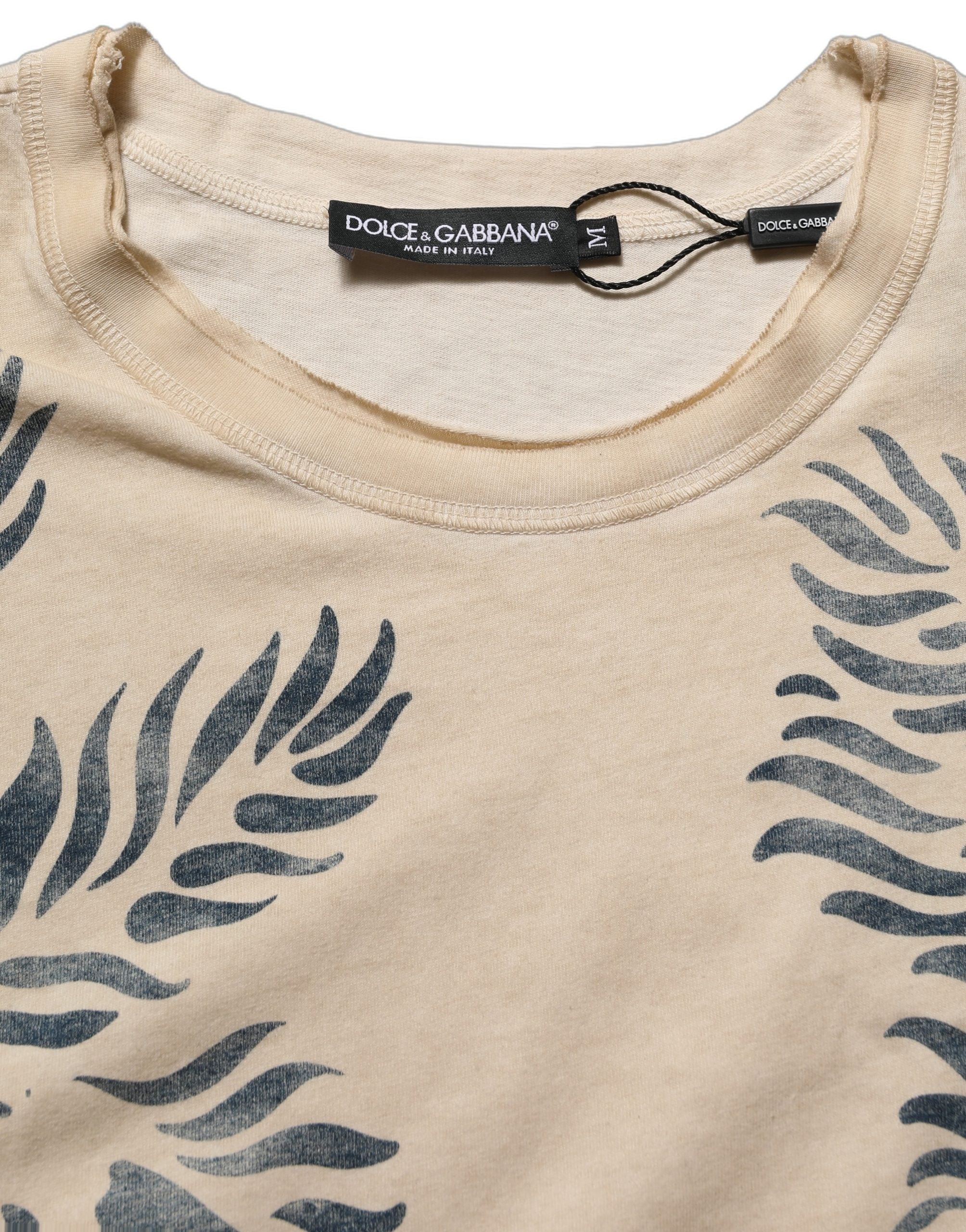 T-shirt beige en coton avec imprimé graphique Dolce & Gabbana, col rond, style casual élégant.