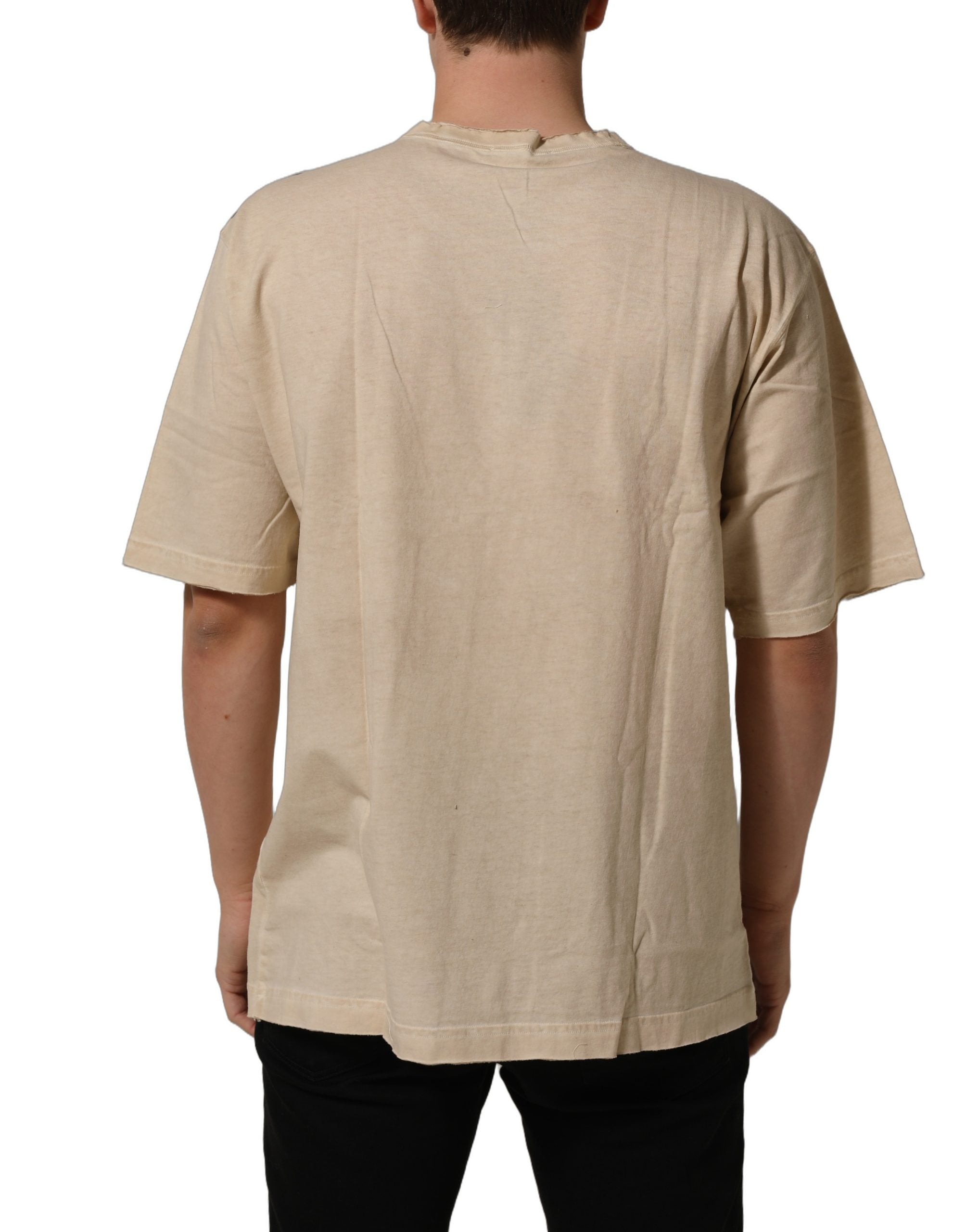 T-shirt beige en coton Dolce & Gabbana avec impression graphique à col rond, mode élégante et décontractée.