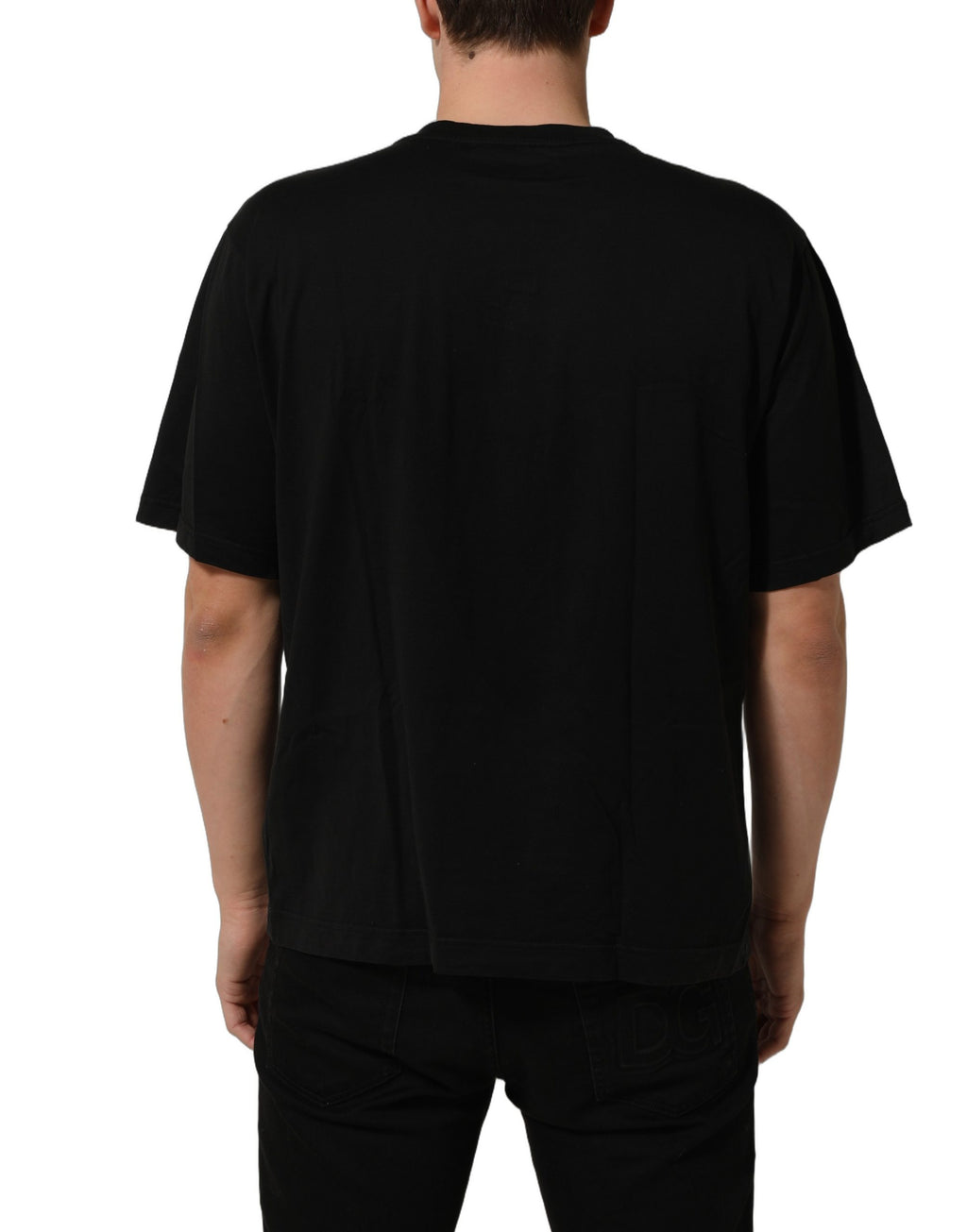 T-shirt noir Dolce & Gabbana en métal avec logo DG à manches courtes, style moderne et élégant.