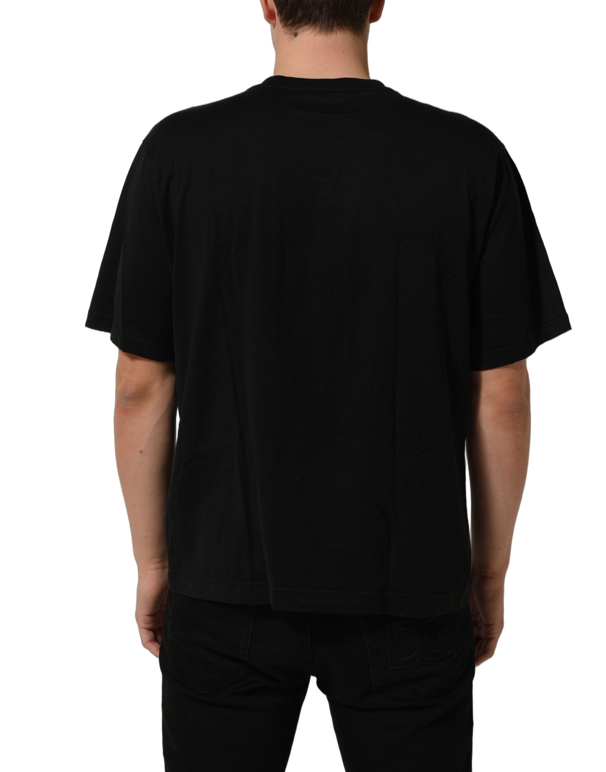 T-shirt noir Dolce & Gabbana en métal avec logo DG à manches courtes, style moderne et élégant.