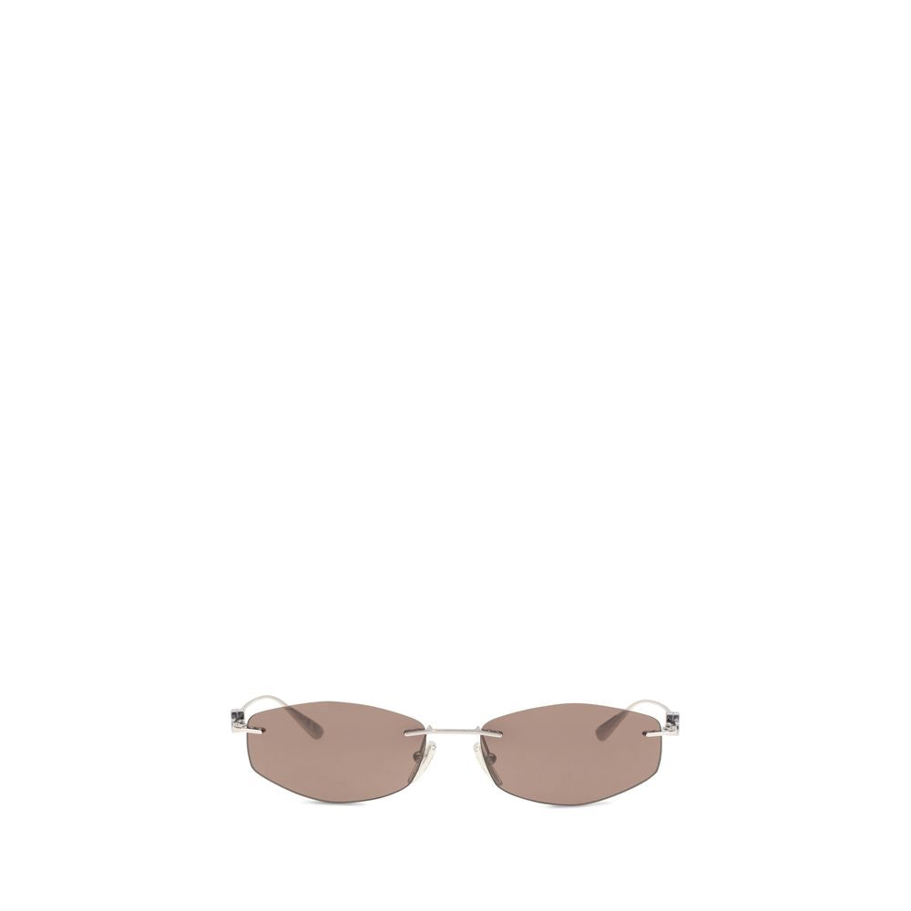 Lunettes de soleil en métal argenté Balenciaga, style élégant avec monture fine et branches larges.