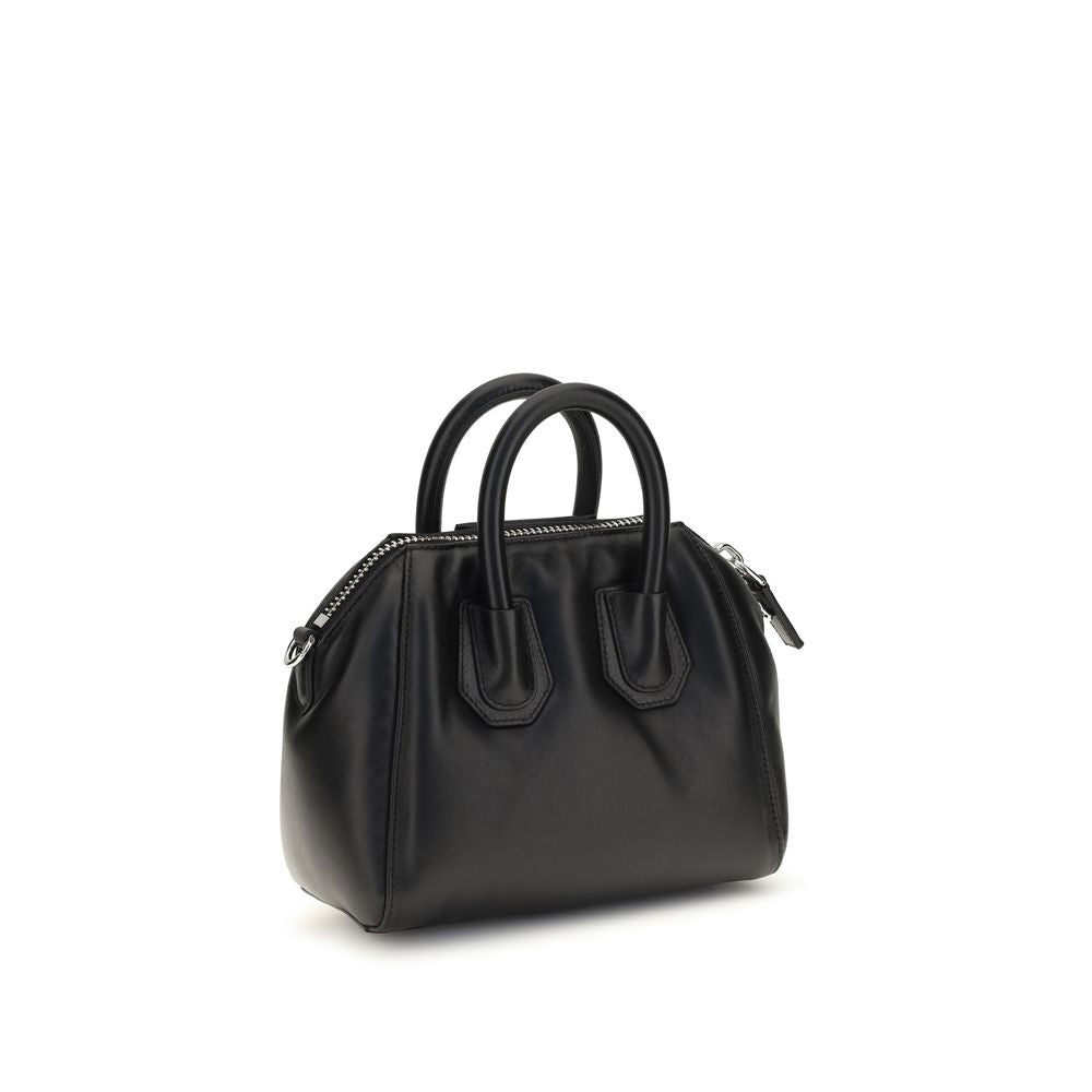 Sac à main Givenchy en agneau noir Ovis Aries, élégant et sophistiqué, avec détails en cuir et finition raffinée.