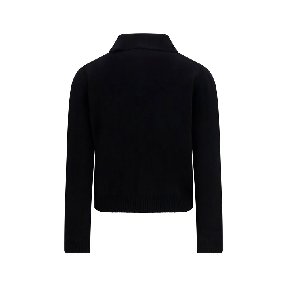 Pull Givenchy en cachemire noir avec col rond et manches longues, doux et élégant pour un style sophistiqué.