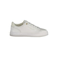 Sneaker blanche en polyuréthane Tommy Hilfiger pour femme, vue de face, avec détails de la marque visible.