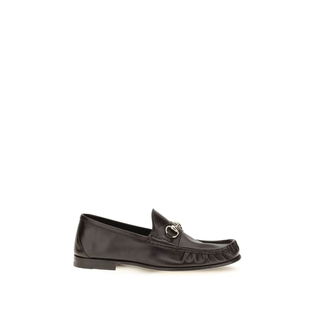 Chaussures Gucci en cuir de veau marron Bos Taurus, mocassins slip-on élégants pour homme avec semelle en cuir.
