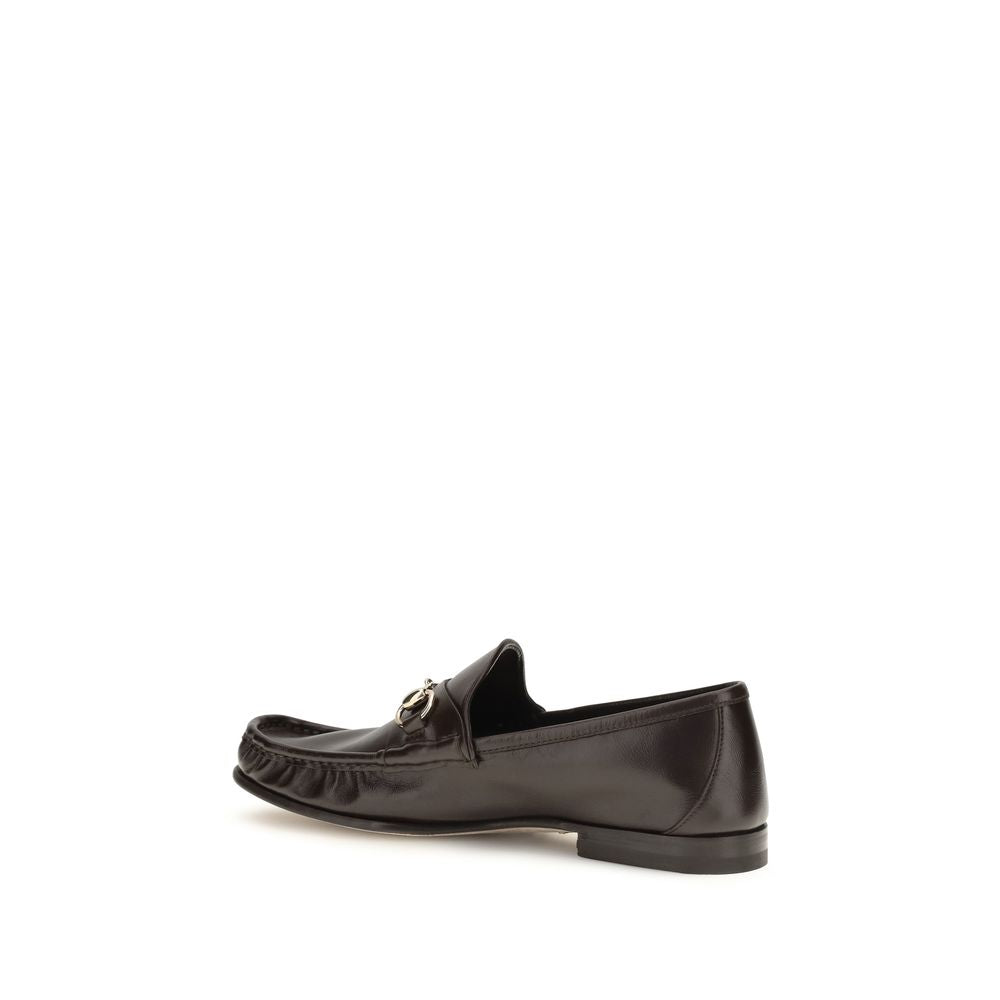Chaussures Gucci en cuir de veau marron Bos Taurus, mocassins slip-on élégants pour homme.