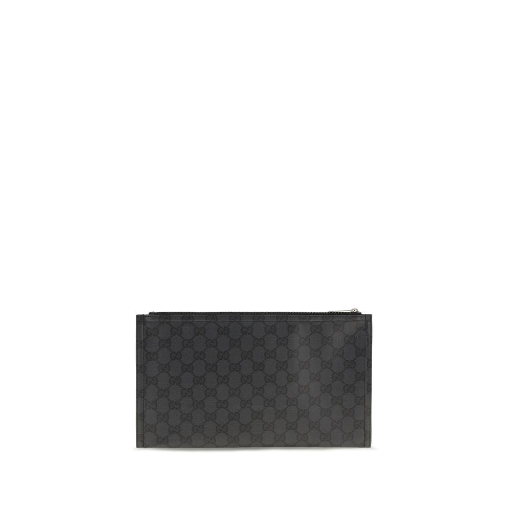 Pochette en tissu noir Gucci, élégante sac clutch avec détails raffinés, idéal pour les occasions spéciales.