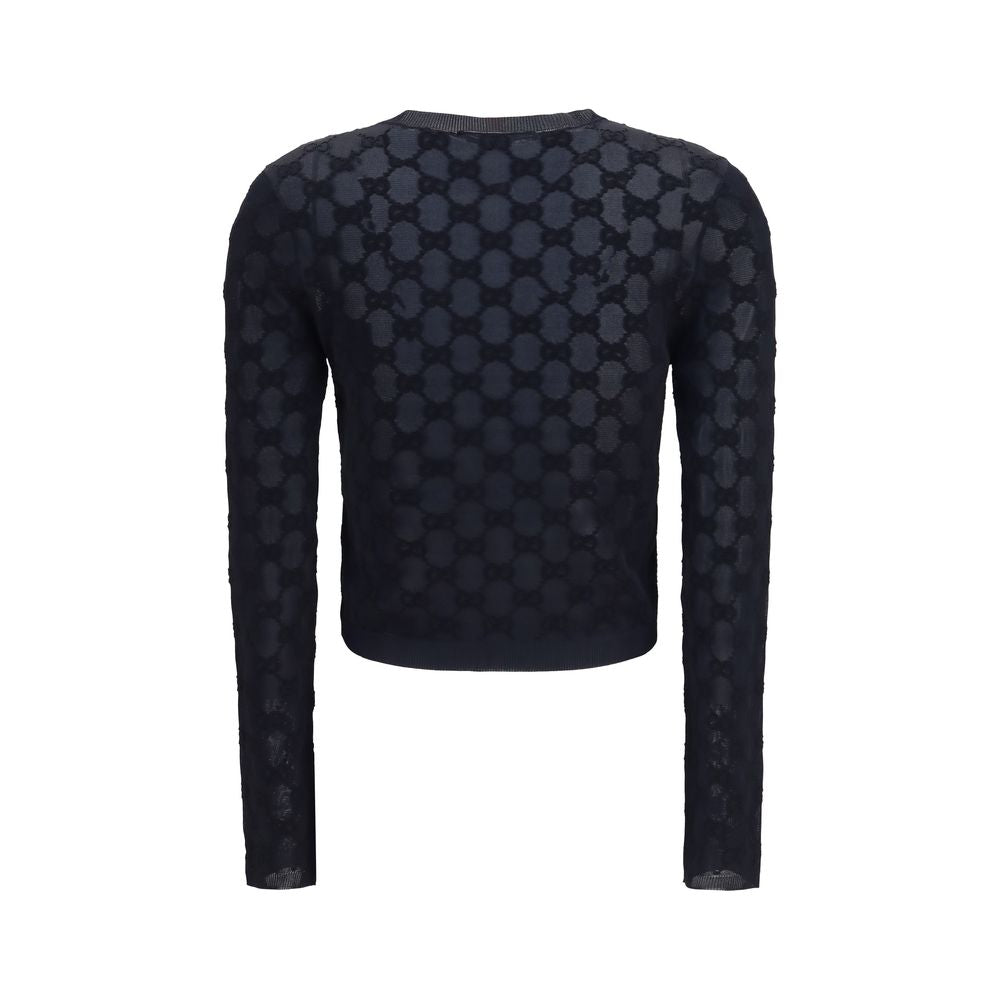 Cardigan noir en viscose de Gucci affichant un tissu doux et élégant, avec un design classique et des détails sophistiqués.