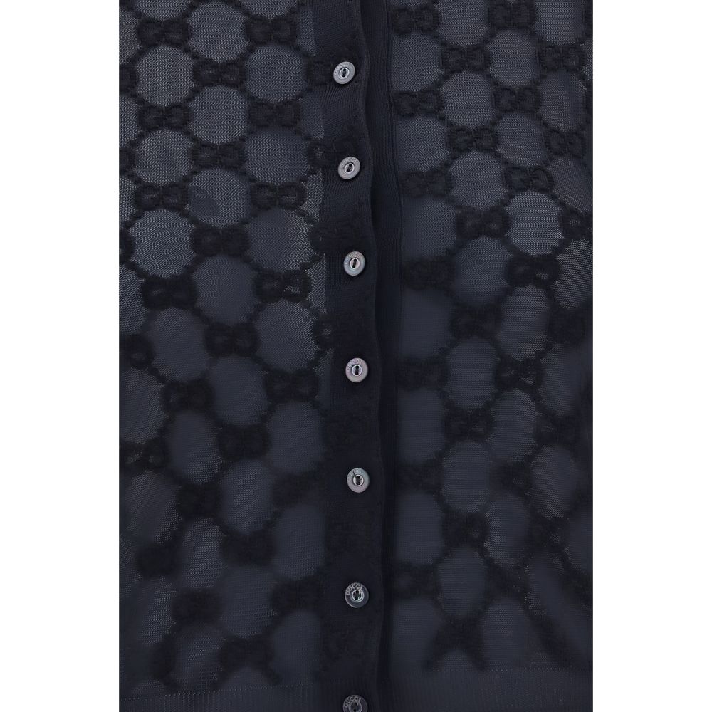 Cardigan Gucci noir en viscose avec boutons, porté sur un mannequin, vue de face.