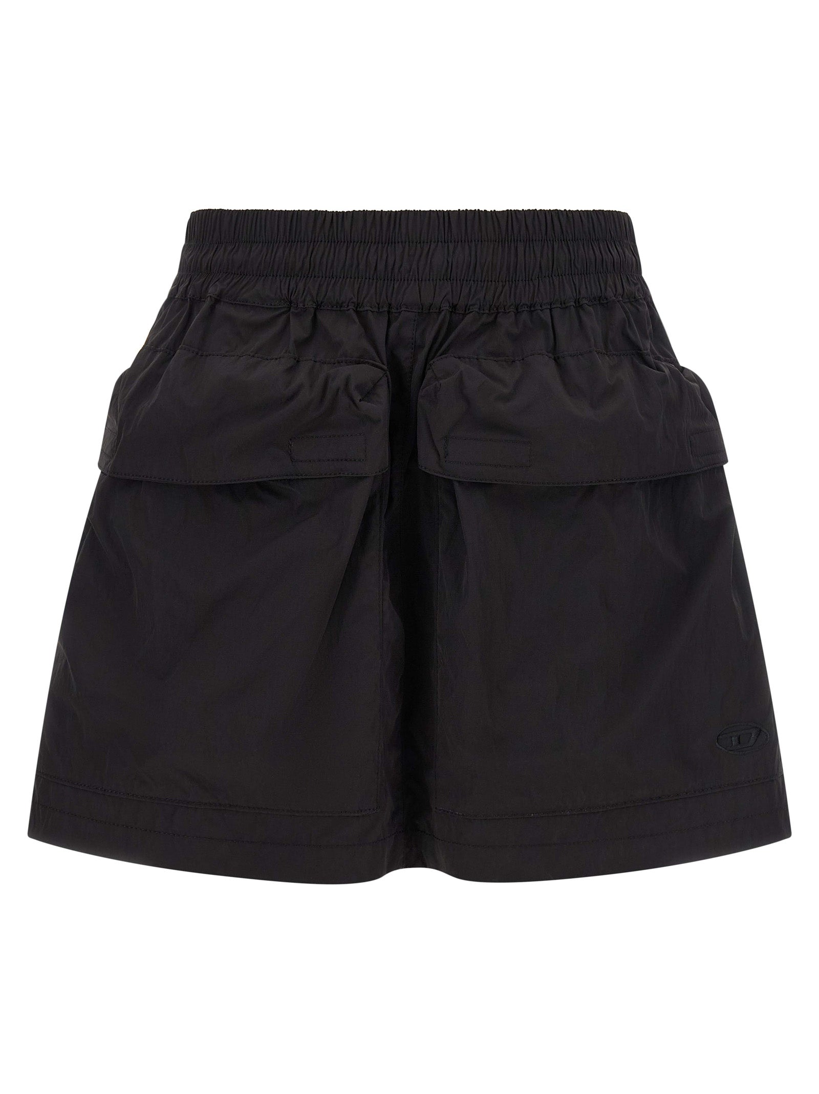 Jupe longue en polyamide noire de marque Diesel, style moderne avec coupe fluide et détails élégants.