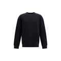 Sweat-shirt noir en coton de Balmain avec logo brodé, porté façon décontractée, vue de face.