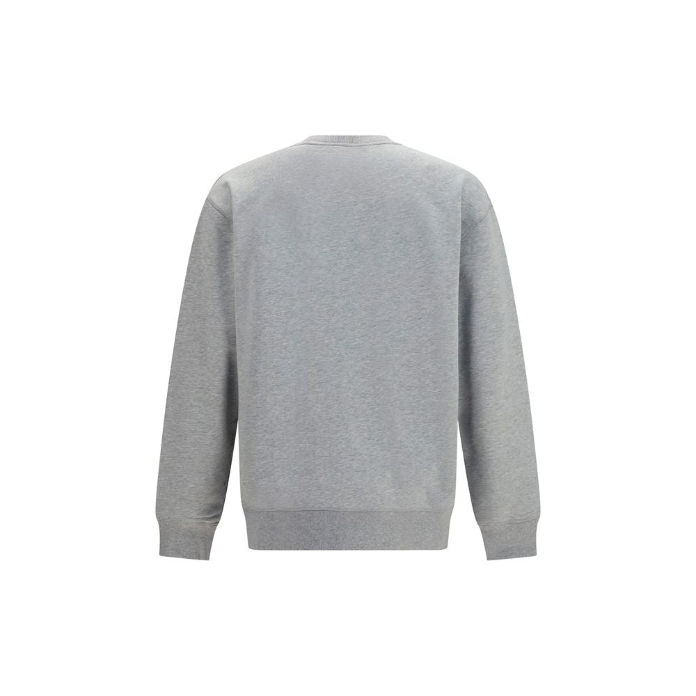 Sweatshirt gris en coton de Balmain, vue de face, avec logo discret sur la poitrine, pour un style décontracté et sophistiqué.