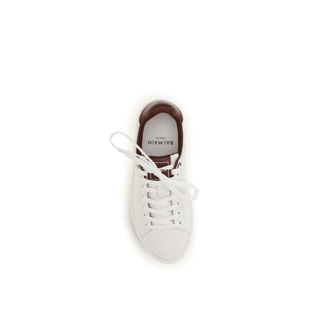 Chaussures Balmain Bos Taurus en cuir blanc pour athlétisme, sneakers en cuir de veau blanc, design moderne et élégant.