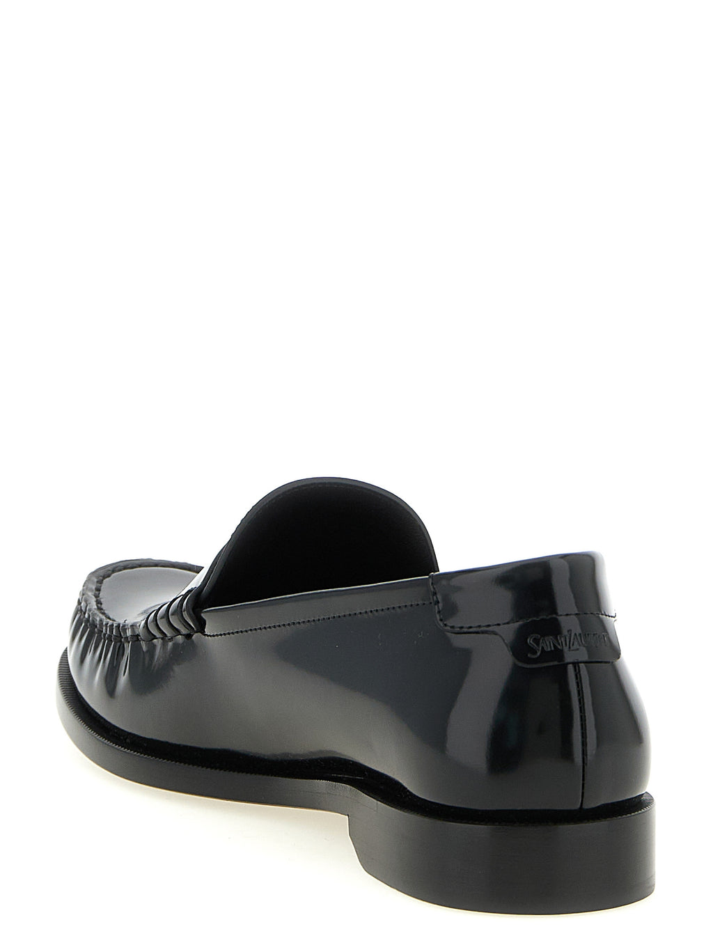 Chaussures mocassins Saint Laurent en cuir de veau noir, sans lacets, élégantes et classiques pour homme.