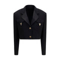 Blazer noir en laine Versace Oves Aries, coupe élégante avec détails sophistiqués, porté sur un mannequin.