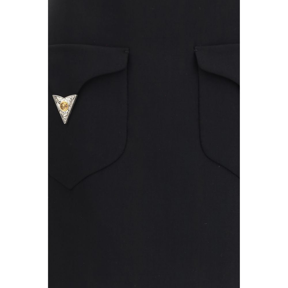 Jupe courte Versace en laine noire Oves Aries, style mini, avec détails élégants, portée par un mannequin.