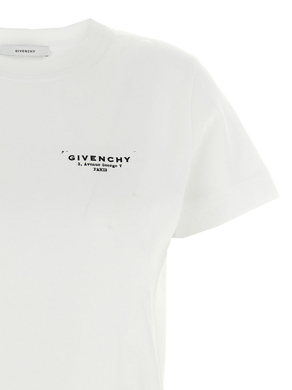 T-shirt en coton bicolore Givenchy, coupe classique, avec logo discret, porté sur mannequin.