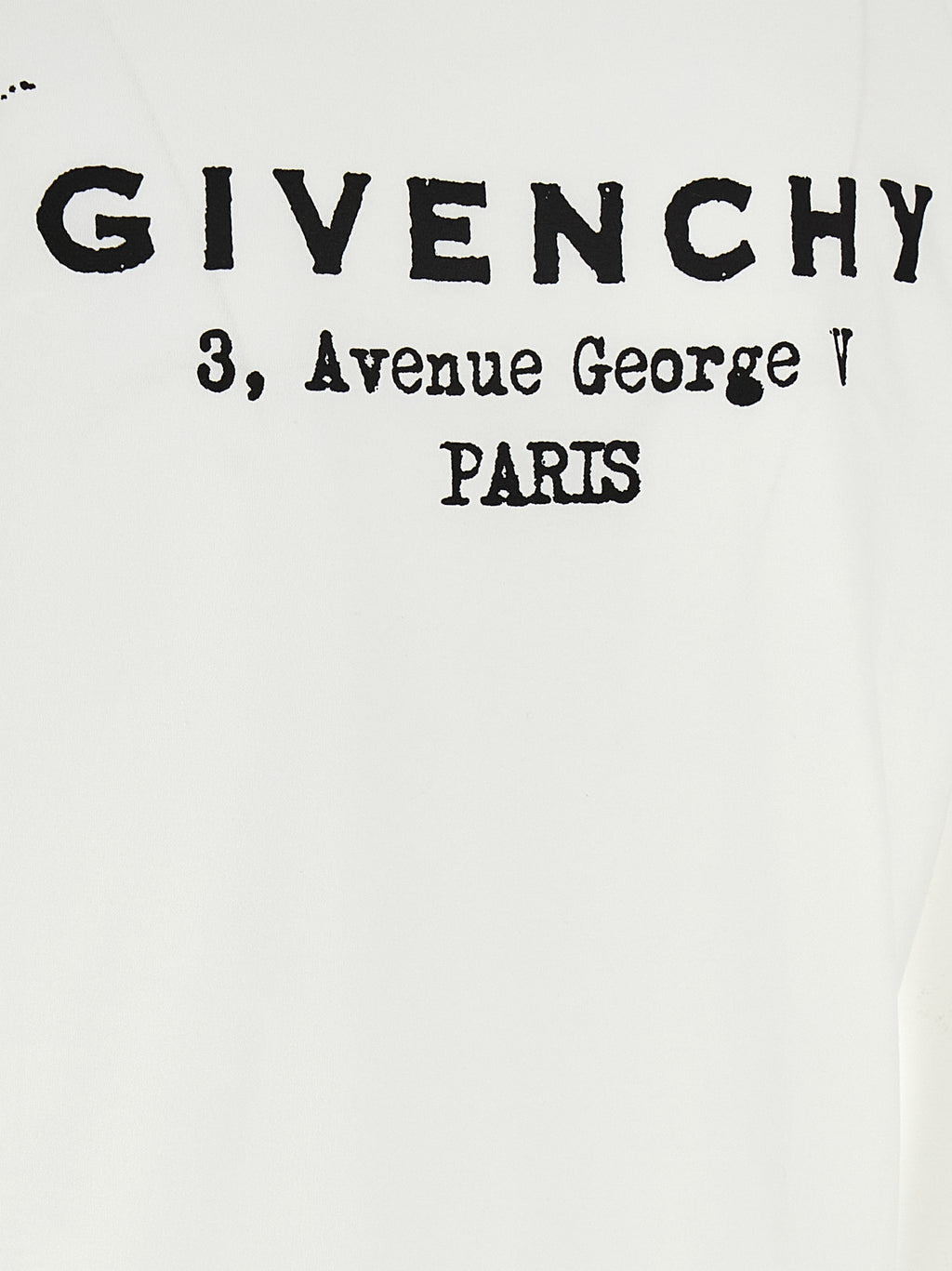 T-shirt en coton bicolore Givenchy, coupe classique, avec logo visible, porté sur mannequin, style élégant et moderne.