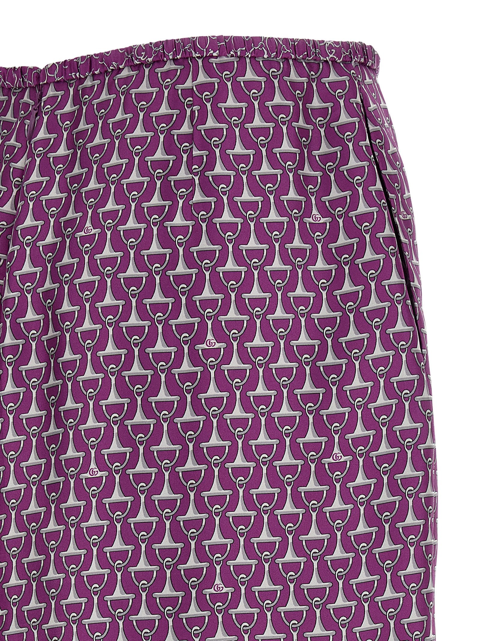 Jupe midi en soie violette de Gucci, vêtement élégant avec coupe fluide et design sophistiqué, vue de face.