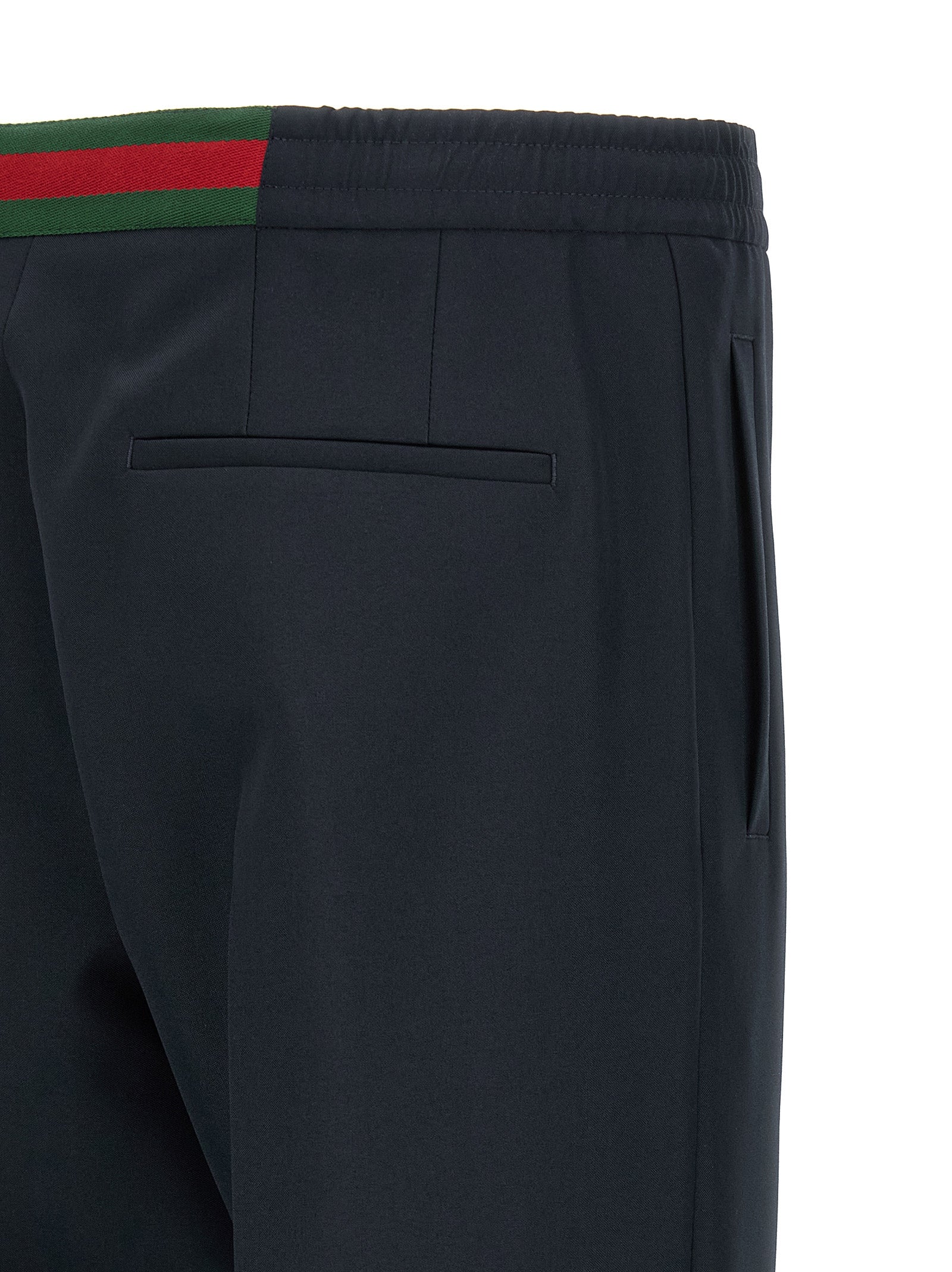 Pantalons décontractés en polyester bleu de Gucci, style casual, avec coupe moderne et détails élégants.