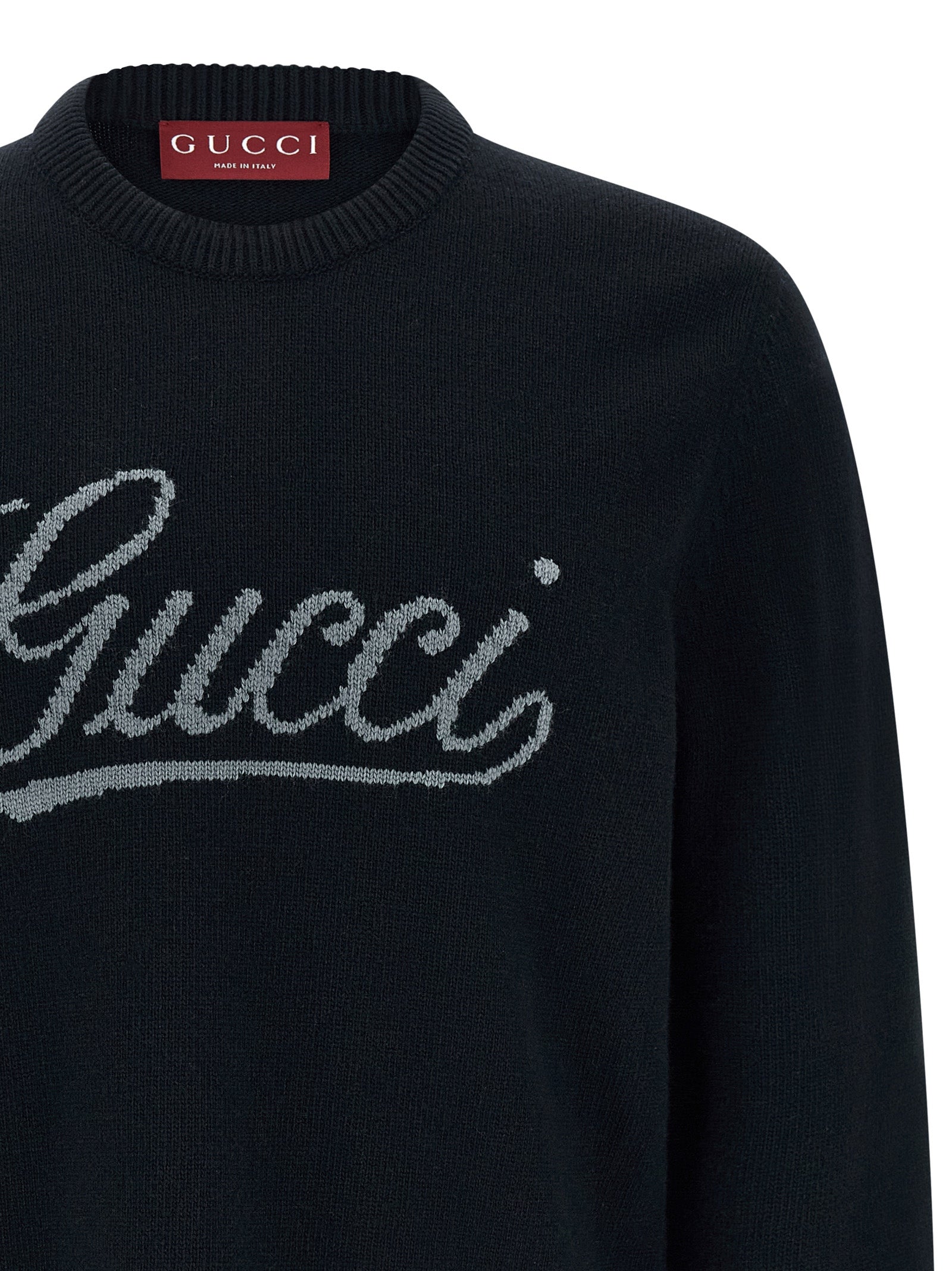 Cardigan en laine bleue Gucci, mode élégante pour homme ou femme, avec détails de qualité visible sur l'image.