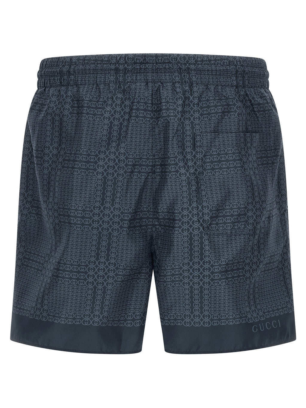 Shorts de bain en polyester bleu de Gucci, style décontracté avec logo Gucci visible sur le devant.