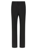 Pantalon de costume noir en polyester Gucci, coupe élégante, porté sur un mannequin avec une ceinture assortie.