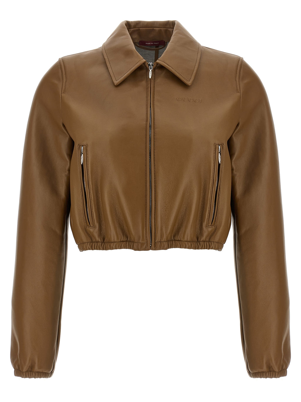 Veste en cuir d'agneau beige de Gucci, coupe élégante et détails sophistiqués, vue de face sur un mannequin.
