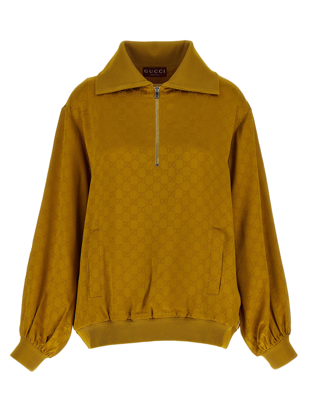 Cardigan bicolore en viscose Gucci, vue de près, avec détails de finition élégants et logo Gucci visible.