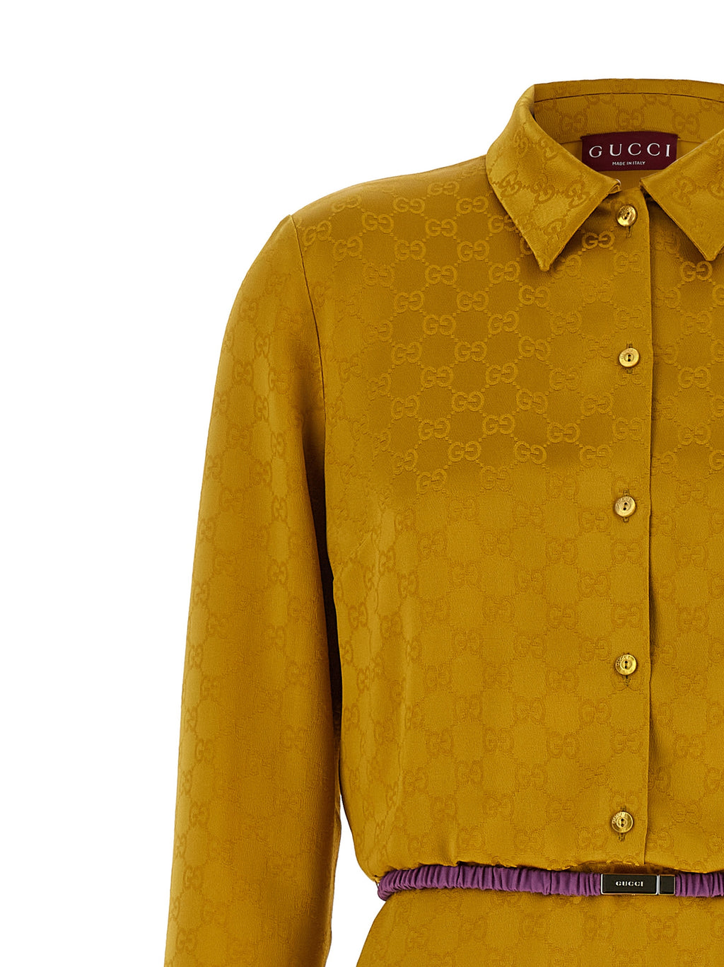 Robe midi bicolore en viscose de Gucci, avec coupe élégante et détails modernes, portée par un mannequin.