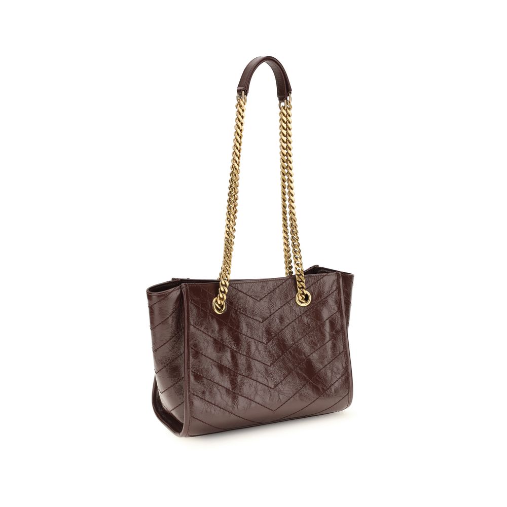 Sac à main Saint Laurent Bos Taurus en cuir de veau marron, sacoche élégante avec détails sophistiqués.