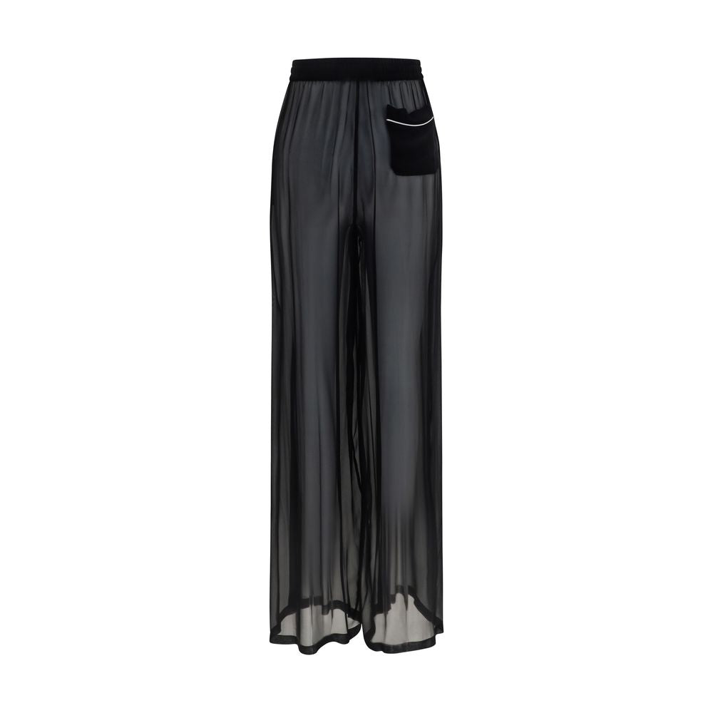 Pantalons décontractés en soie noire Dolce & Gabbana, style élégant et confortable pour un look sophistiqué.