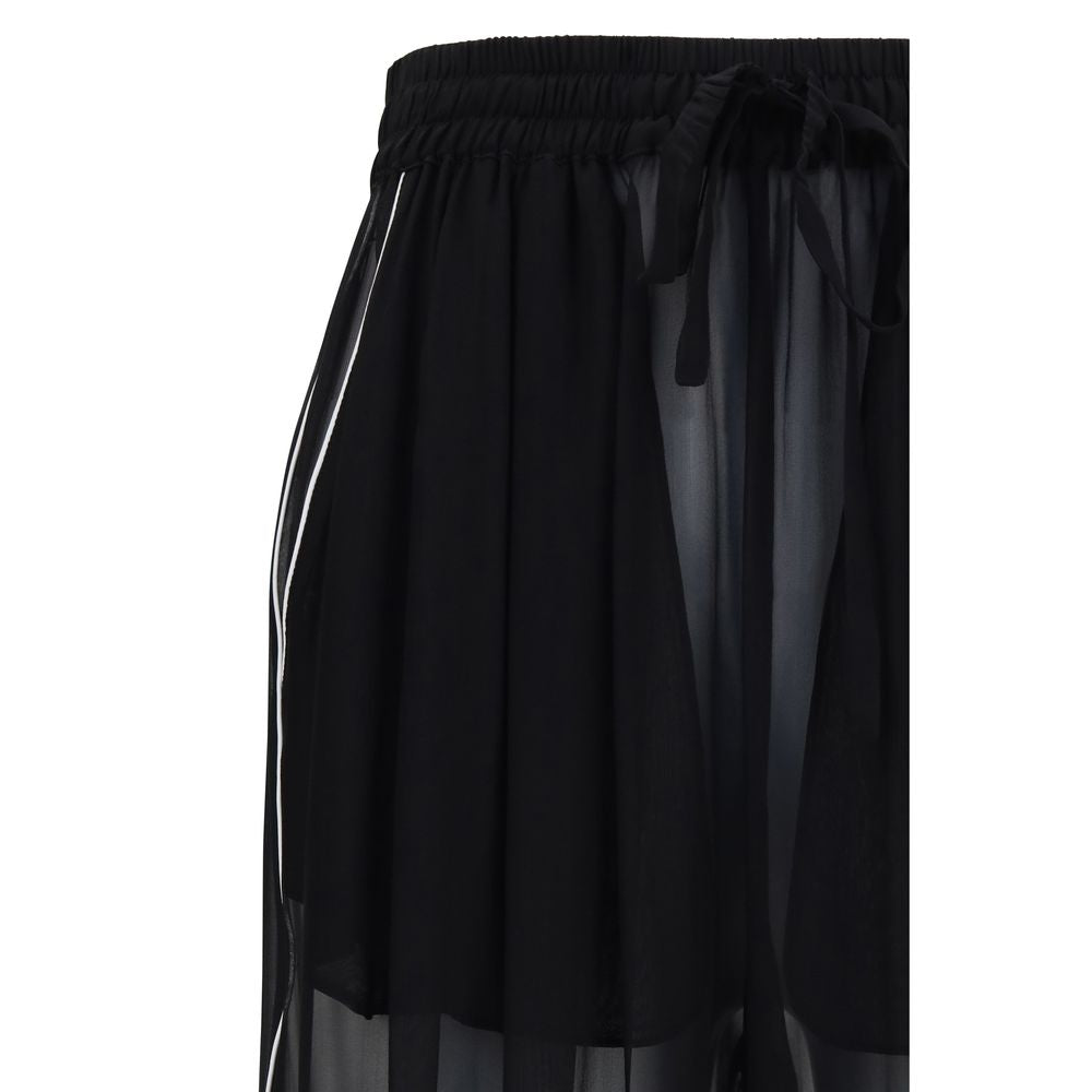 Pantalon décontracté en soie noire de Dolce & Gabbana, coupe élégante et tissu fluide, pour un style chic et confortable.