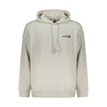 Sweatshirt gris en coton pour homme de Tommy Hilfiger, avec logo et col rond, porté en position décontractée.