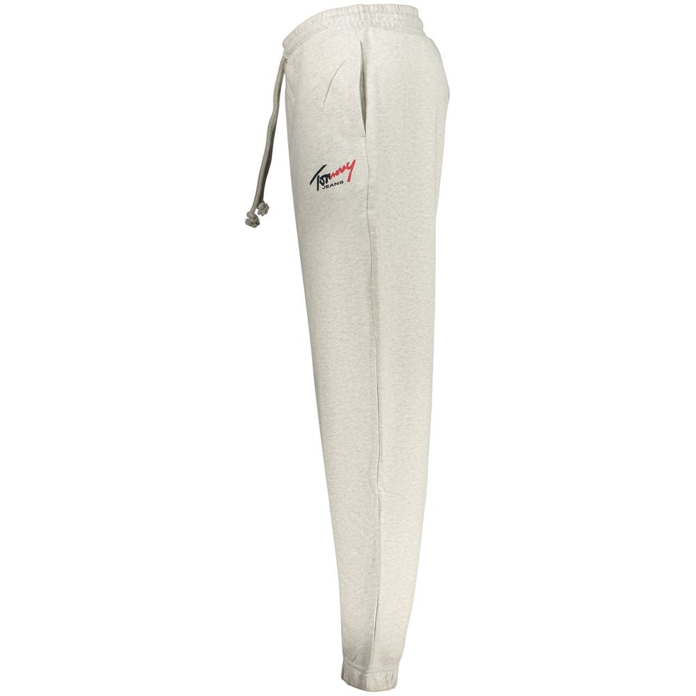Pantalon homme en coton gris de Tommy Hilfiger, coupe classique, détails élégants, adapté pour un style décontracté ou professionnel.