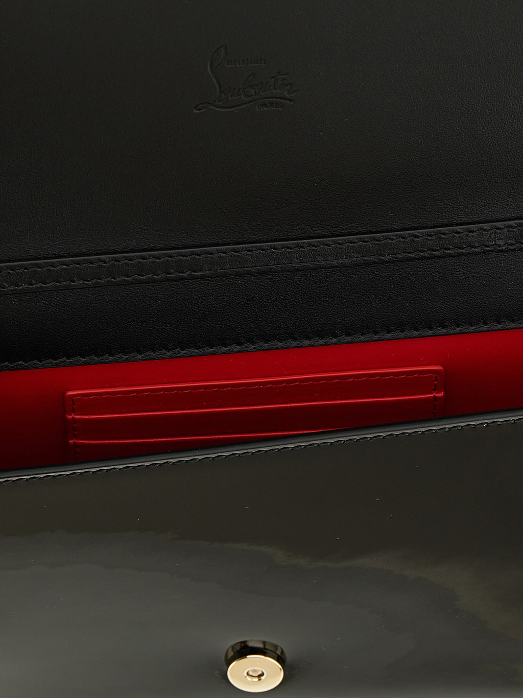 Christian Louboutin Clutch aus schwarzem Kalbsleder