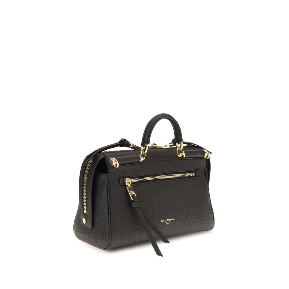 Sac à main Dolce & Gabbana en cuir de veau noir Bos Taurus avec poignées et détails élégants.