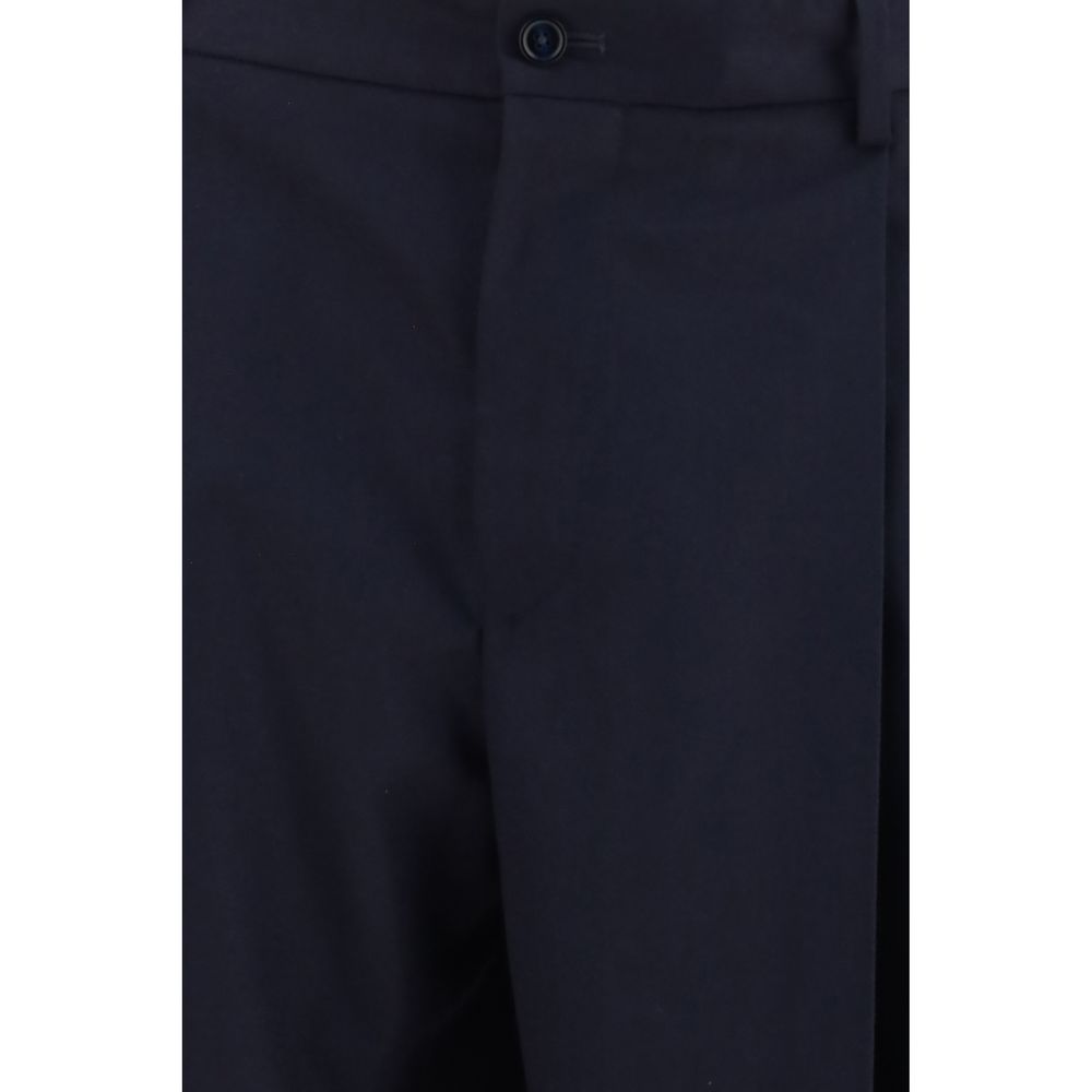 Pantalon Dolce & Gabbana en laine bleue Oves Aries, coupe élégante, tissu de qualité, porté sur un mannequin.