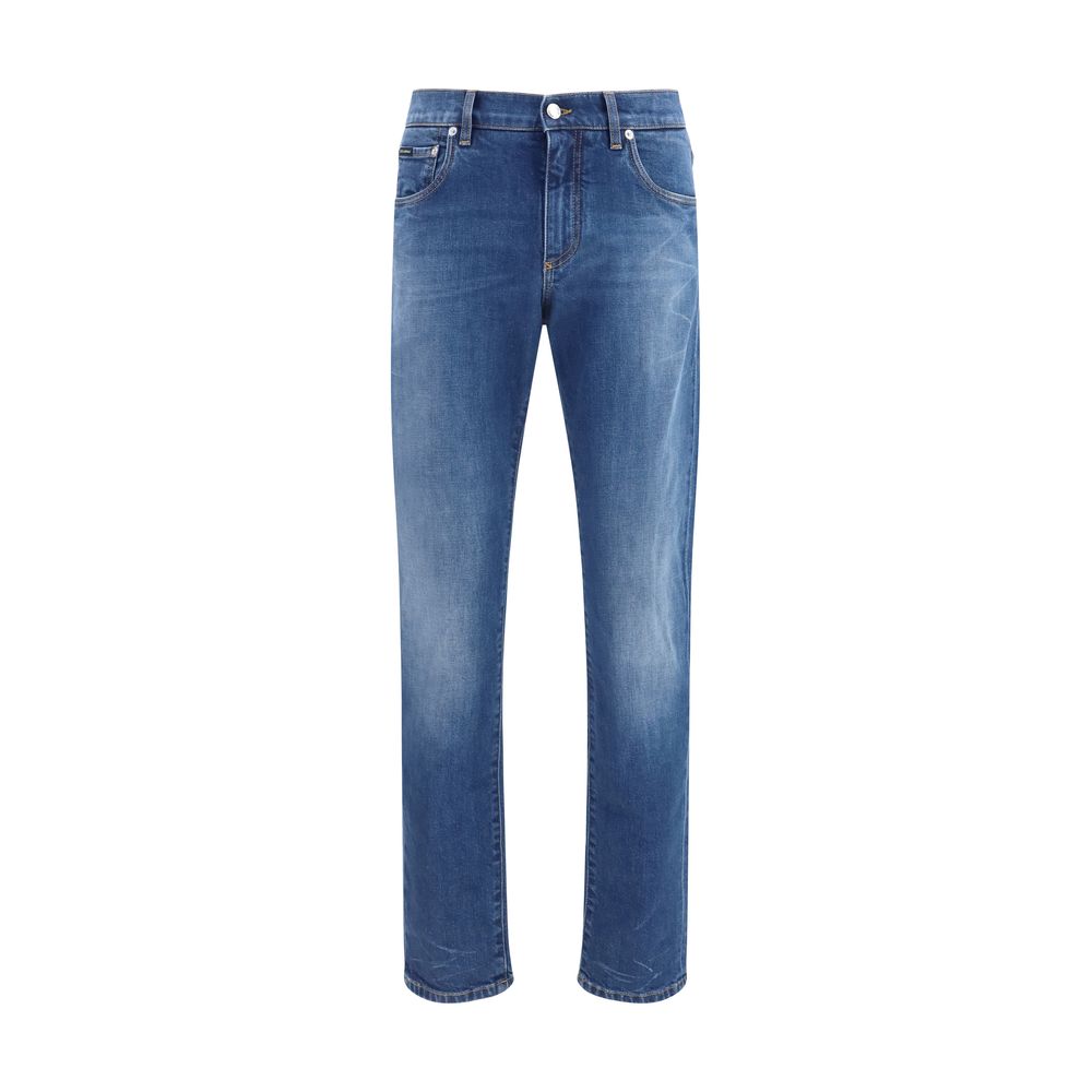 Jeans slim en coton bleu Dolce & Gabbana, ajustés, avec fermeture éclair et poches avant, vue de face.