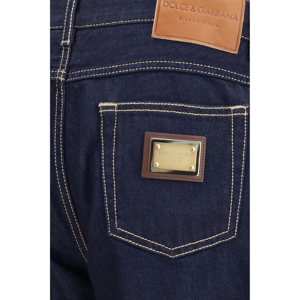 Jeans en denim en coton bleu Dolce & Gabbana, coupe classique avec détails de marque.
