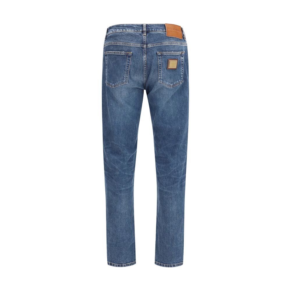 Jeans droits en coton bleu de Dolce & Gabbana, style classique et coupe droite, visible en détail sur l'image.