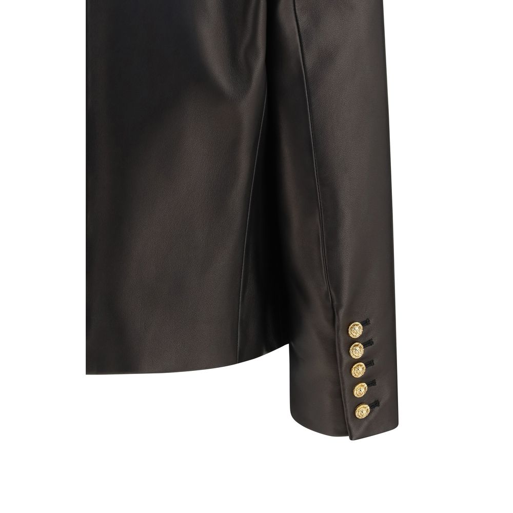 Veste en cuir noir Balmain en agneau ovis Aries, coupe élégante et détails sophistiqués visibles sur l'image.