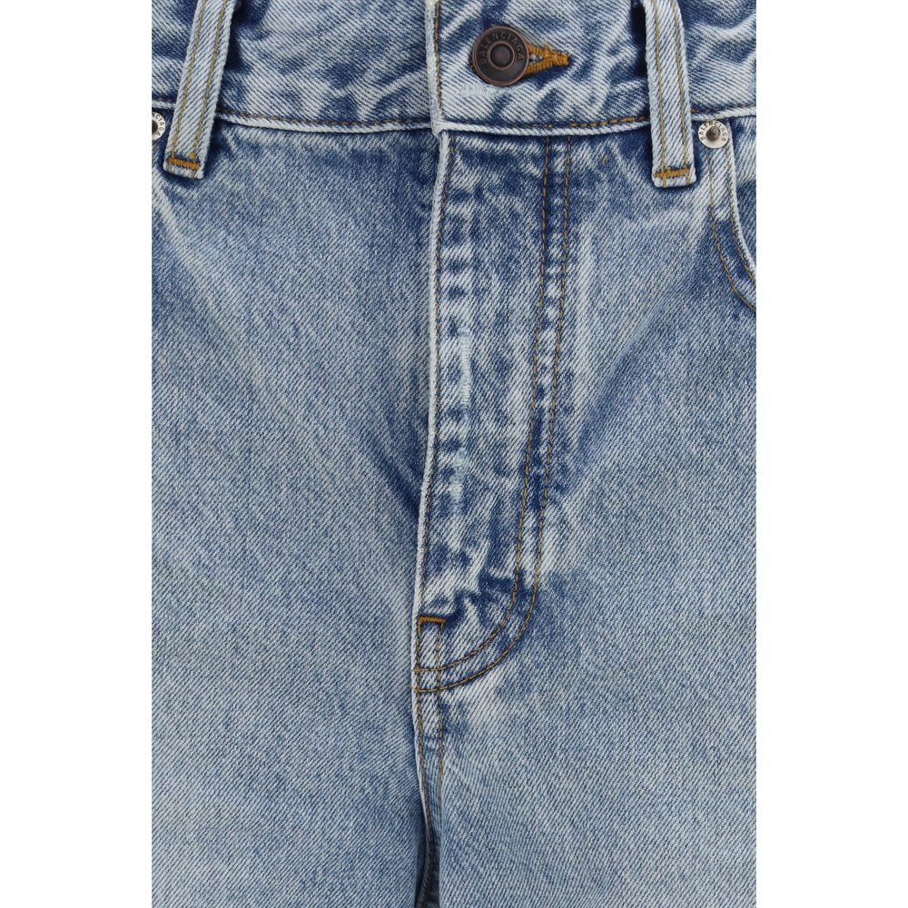 Jeans cropés en coton bleu Balenciaga, coupe courte, avec détails modernes et style décontracté.