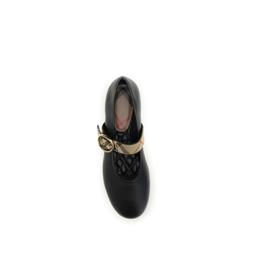 Chaussures ballerines en cuir de veau noir Bos Taurus de Burberry, élégantes et confortables, vues de côté.