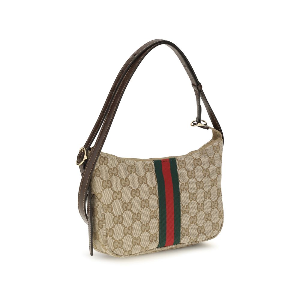 Sac à épaule Gucci beige en polyester avec détails élégants, visible dans l'image.