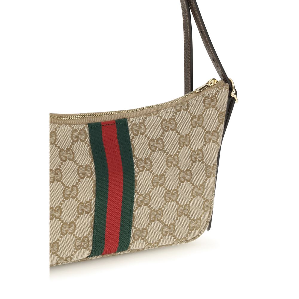 Sac à bandoulière en polyester beige Gucci, visible avec détails et textures du matériau.