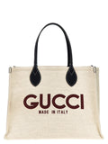 Sac à main Gucci beige en polyéthylène, sac fourre-tout élégant avec poignées, visible de face.